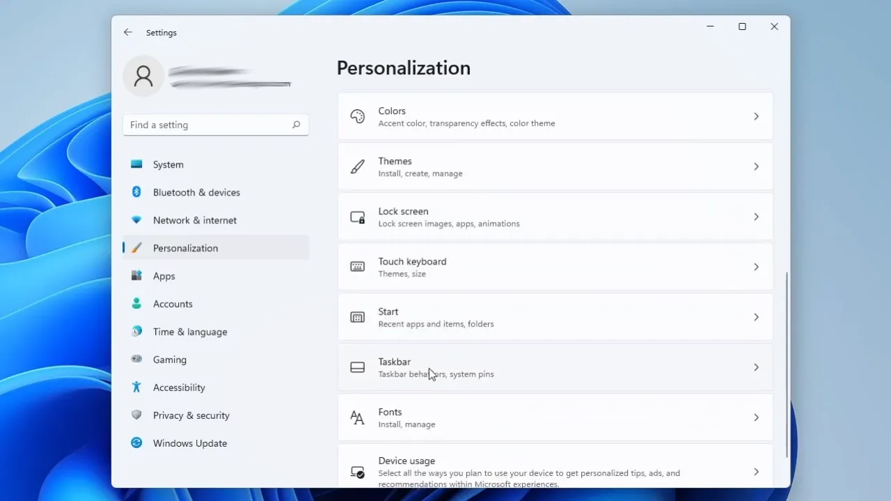Click this Taskbar under Personalization in Windows 11 Settings.