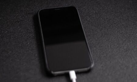 iPhone with charger plugged in