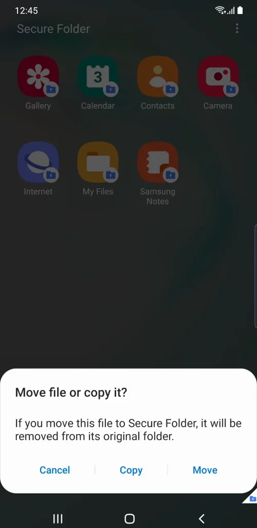 Select all photos and videos to hide, then Done and select Move.