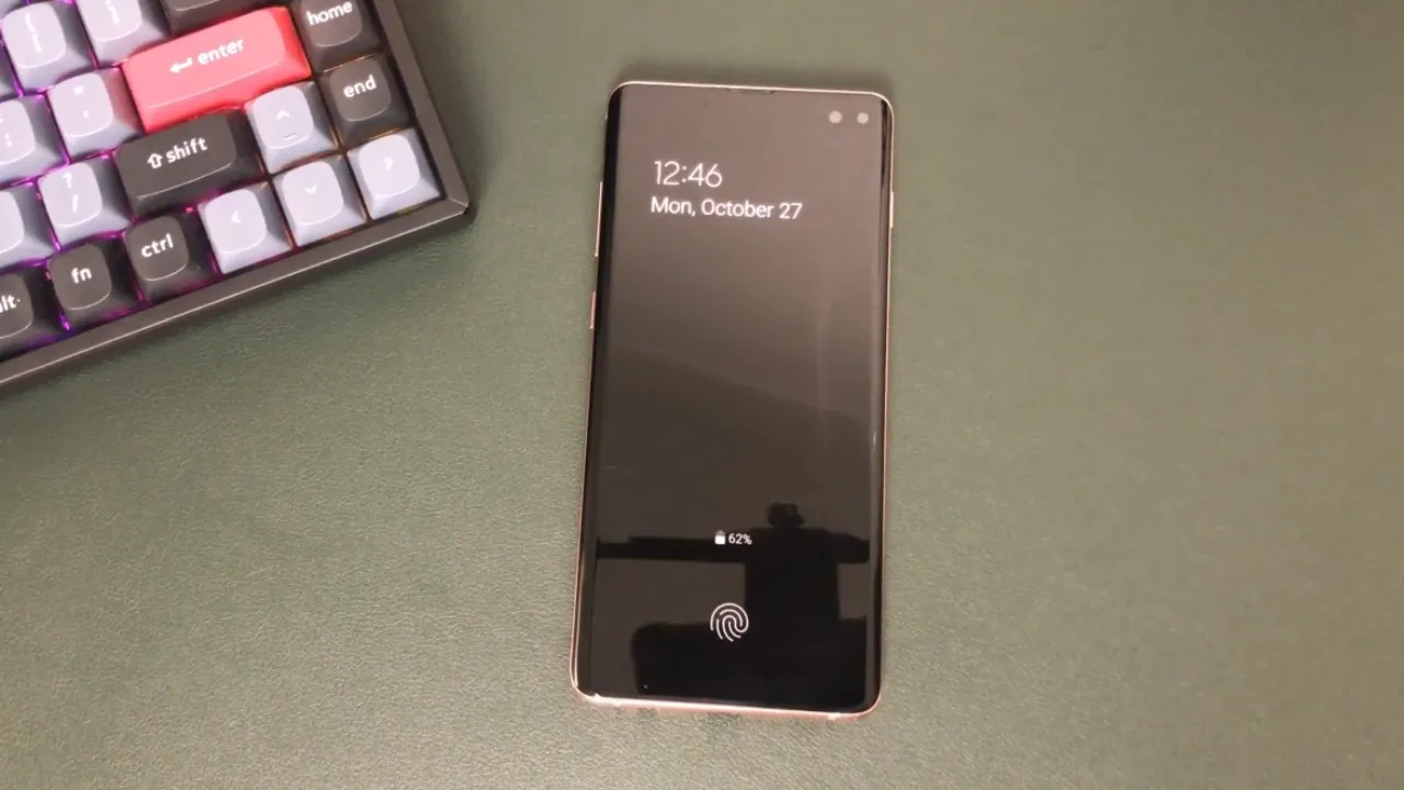 Android phone with always-on display enabled showing time and notifications.