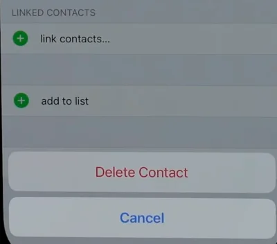 Pop-up with Delete Contact button to remove single contact on iPhone.