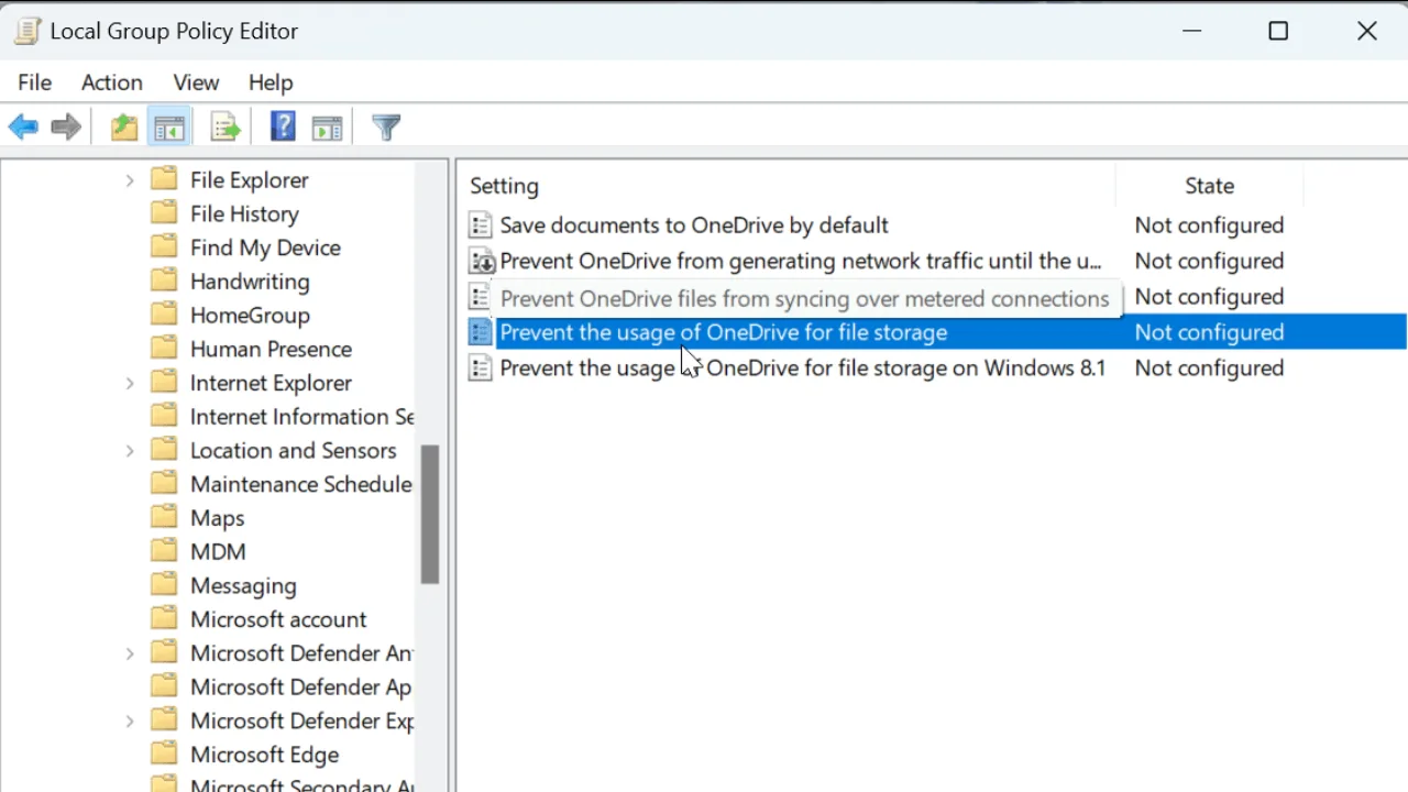 Enable this 'Prevent the usage of OneDrive for file storage' policy.
