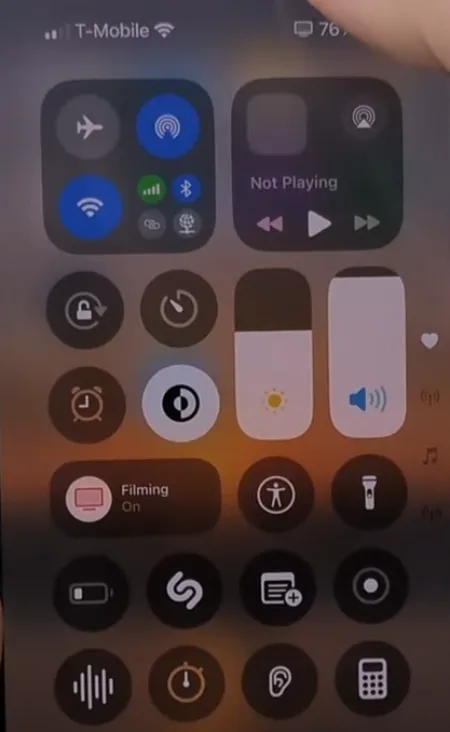 Image showing screen brightness reduced on iPhone.