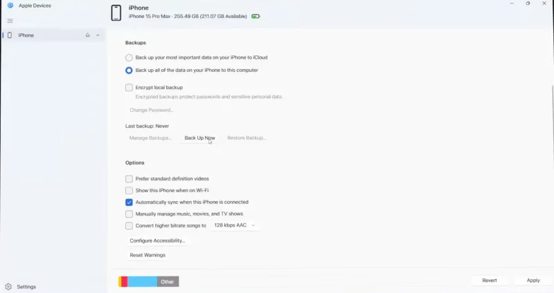 Apple Devices on PC showing the iPhone backup screen, with the radio button for "Back up all of the data on your iPhone to this computer"and "Back Up Now" button.